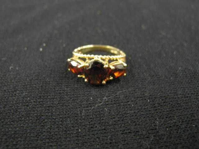 Appraisal: Garnet Ring oval deep rich red gems in k yellow