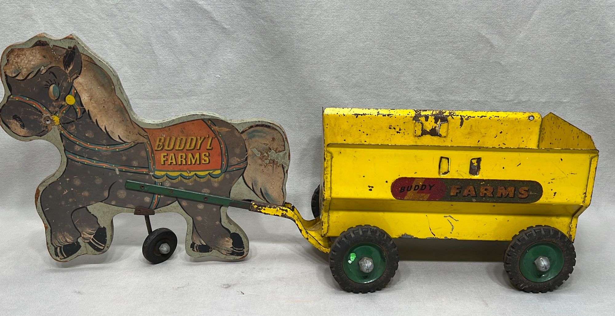 Appraisal: Buddy L Farms horse-drawn ride on toymid th century appx