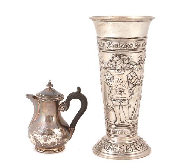 Appraisal: A Continental silver repousse beaker together with a French cream