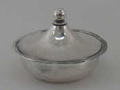 Appraisal: A German silver assay lightly planished circular deep bowl with