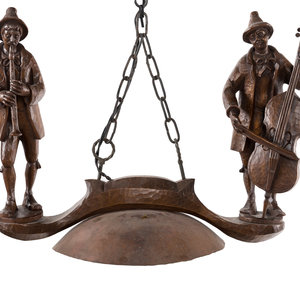 Appraisal: A Black Forest Carved Figural Single-Light Chandelier th Century Height