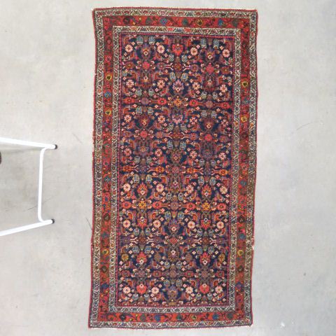 Appraisal: Antique Persian Handmade Rug elaborate overall floral blue field '