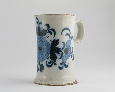 Appraisal: A Delftware mug perhaps Liverpool the slightly waisted body painted