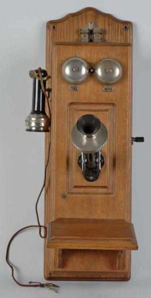 Appraisal: Stromberg-Carlson CTPFF Telephone Description Circa Oak brass bottom receiver and