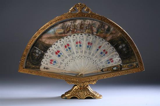 Appraisal: FRENCH HAND-PAINTED FAN Printed paper fan depicting th century figures