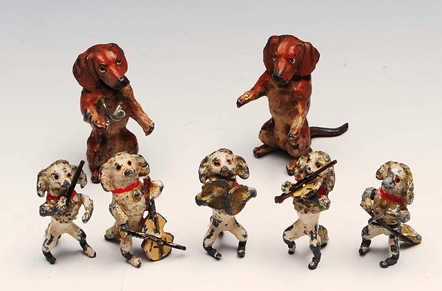 Appraisal: A NOVELTY COLD PAINTED FIVE PIECE MINIATURE DOG BAND comprising