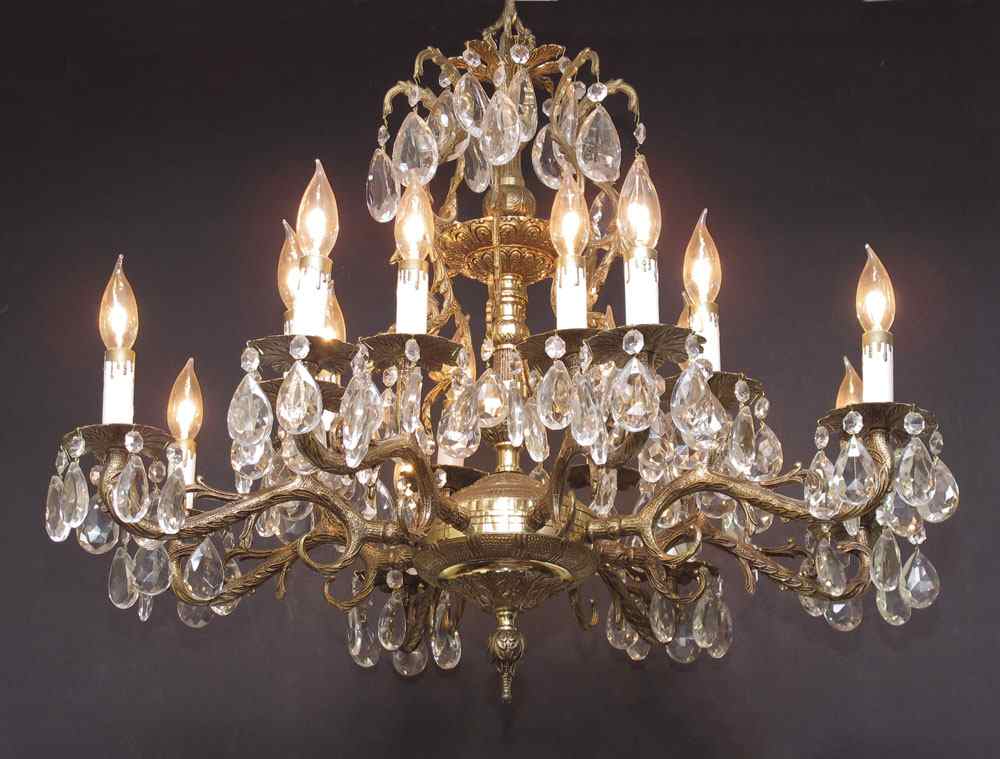 Appraisal: ELEGANT BRASS AND CRYSTAL LIGHT CHANDELIER Heavy brass light chandelier