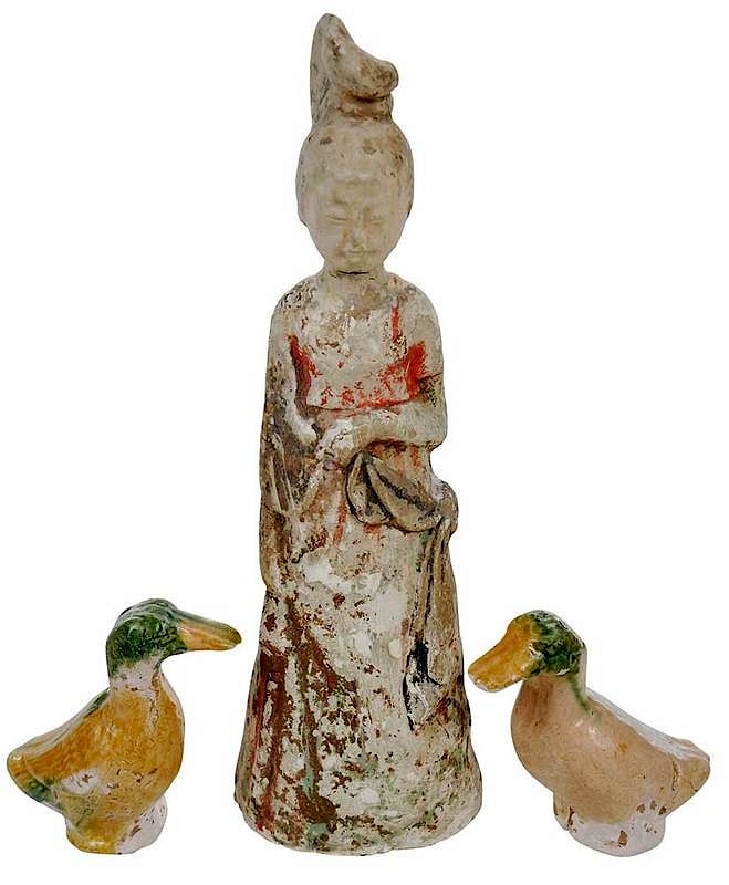 Appraisal: Three Tang Dynasty Pottery Figures Chinese court lady standing arms