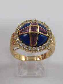 Appraisal: A hallmarked ct gold ring set with rubies diamonds and