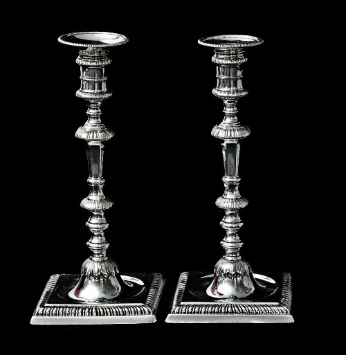 Appraisal: A pair of George II silver candlesticks John Cafe London