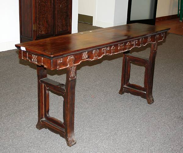 Appraisal: A mixed wood side table with carved apron Republic Period