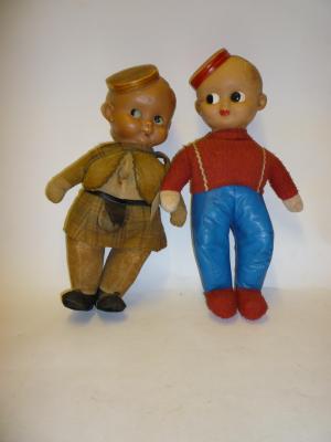 Appraisal: Two English celluloid head dolls in the style of Mabel