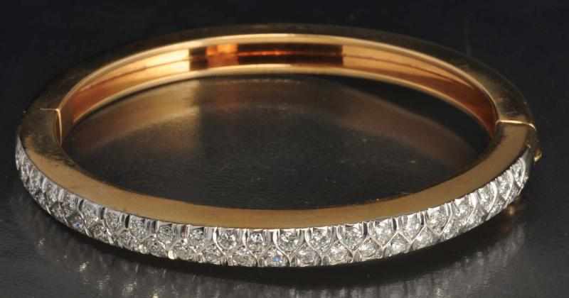 Appraisal: K Two-Tone Y Gold Diamond Hinged Bracelet Description Diamonds ctw