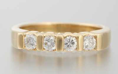 Appraisal: A Ladies' Diamond Band k yellow gold ring set across