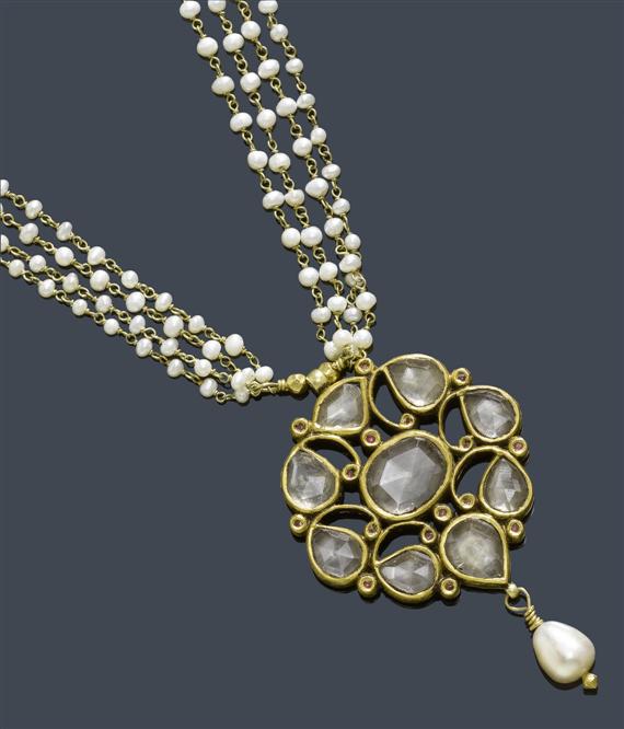 Appraisal: AN INDIAN PEARL AND ROCK QUARTZ NECKLACE Decorative cluster pendant