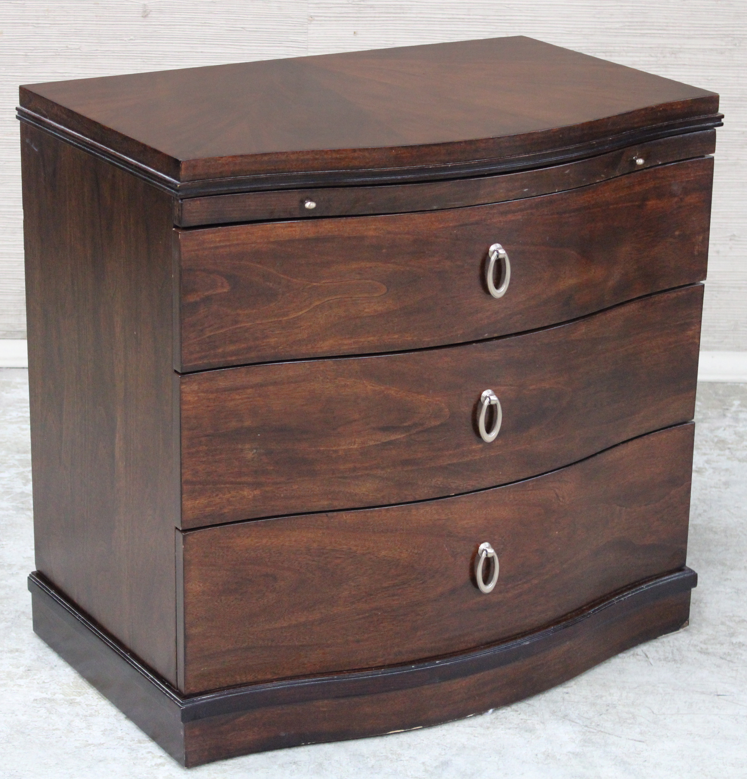 Appraisal: TRANSITIONAL BEDSIDE CHEST Transitional three drawer bedside chest H W