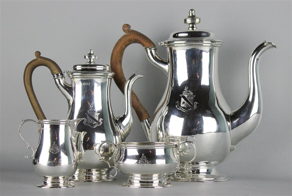 Appraisal: THREE PIECE ENGLISH ARMORIAL SILVER COFFEE SERVICE and London maker's