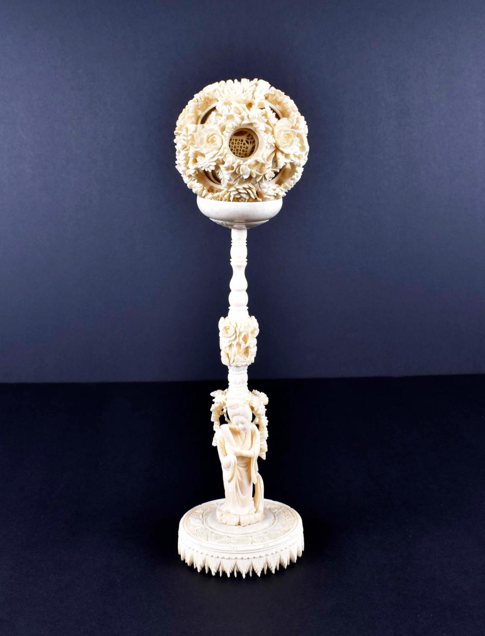 Appraisal: CHINESE CARVED PUZZLE BALL ON STAND th Century The stand