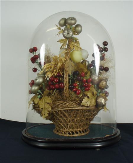 Appraisal: A Victorian mixed fruit display in a basket on a