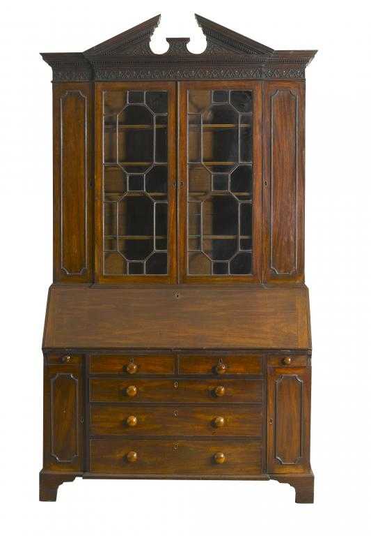 Appraisal: A GEORGE III MAHOGANY BREAKFRONT BUREAU BOOKCASE the open triangular