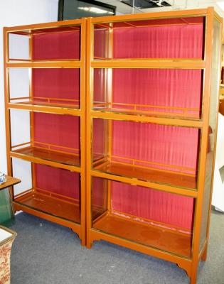 Appraisal: A pair of painted and gilded display cases each of