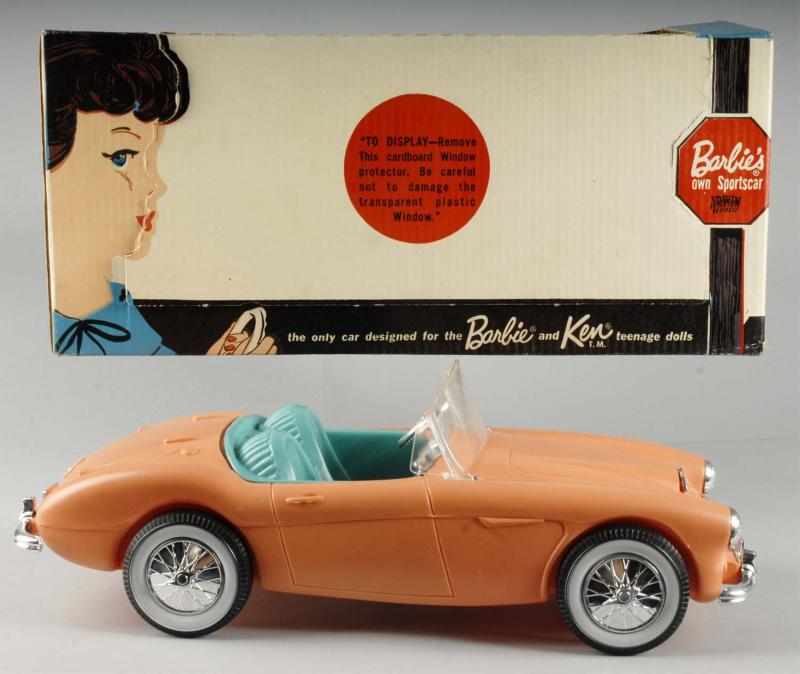 Appraisal: Irwin Barbie Doll Sportscar Description NRFB Irwin peach colored sports