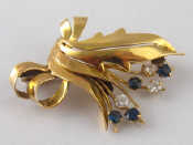 Appraisal: A yellow and white metal tests carat gold sapphire and