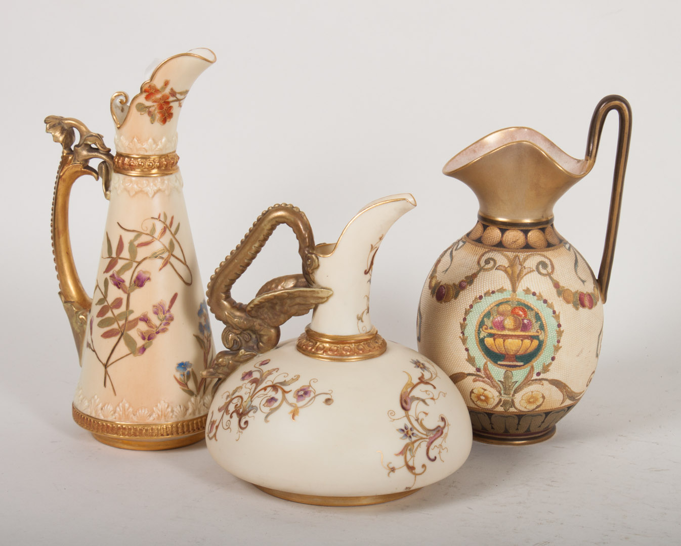 Appraisal: Three English china ewers late th and early th century