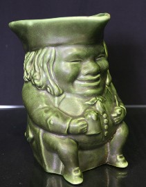 Appraisal: A Melrose ware green glazed Toby jug impressed marks original