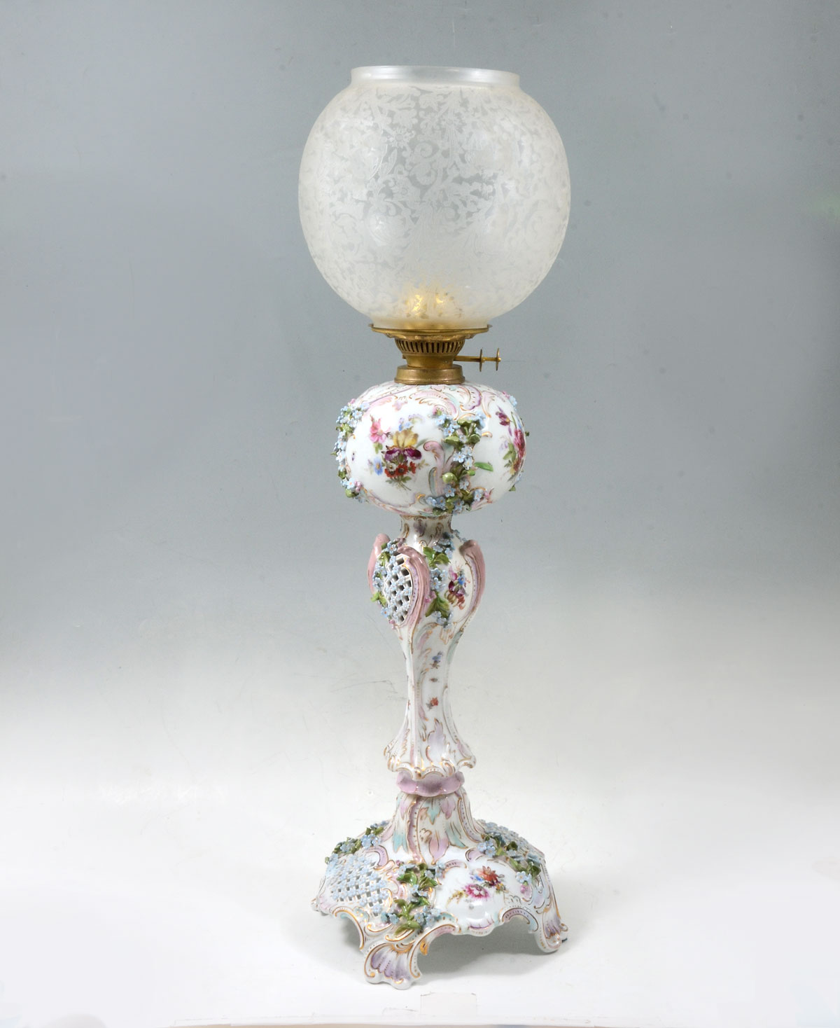 Appraisal: DRESDEN OIL LAMP Tall Dresden lamp having an overall floral