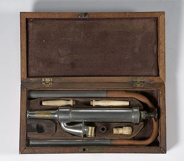 Appraisal: ENEMA KIT IN MAHOGANY CASE ca Includes brass pump bone