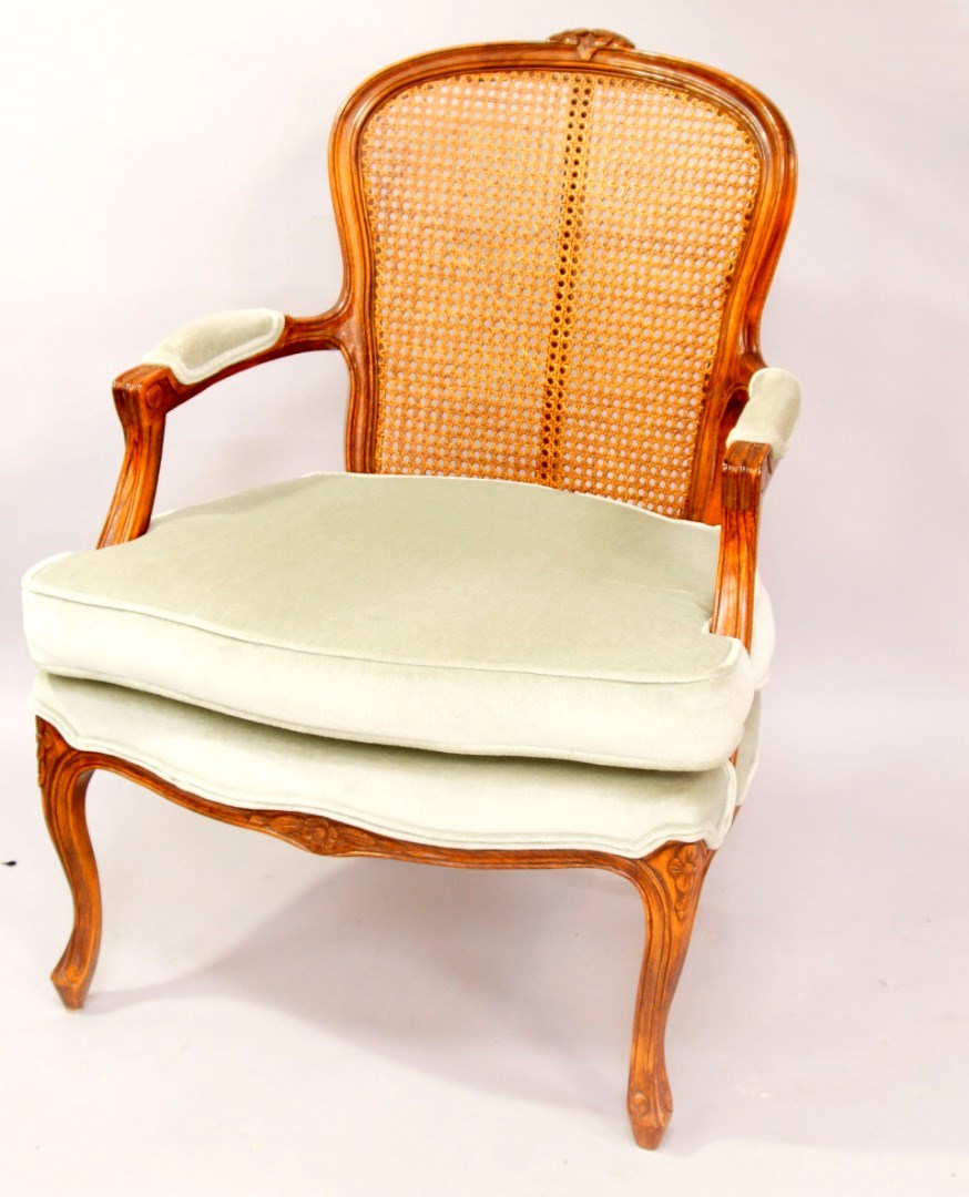 Appraisal: A stained beech fauteuil late thC with cane back and