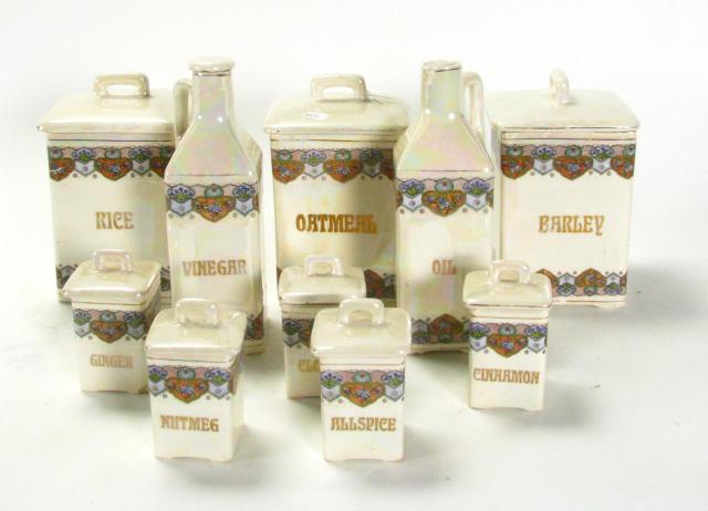 Appraisal: Czechoslovakian Porcelain Canister Set including eight lidded canisters plus vinegar