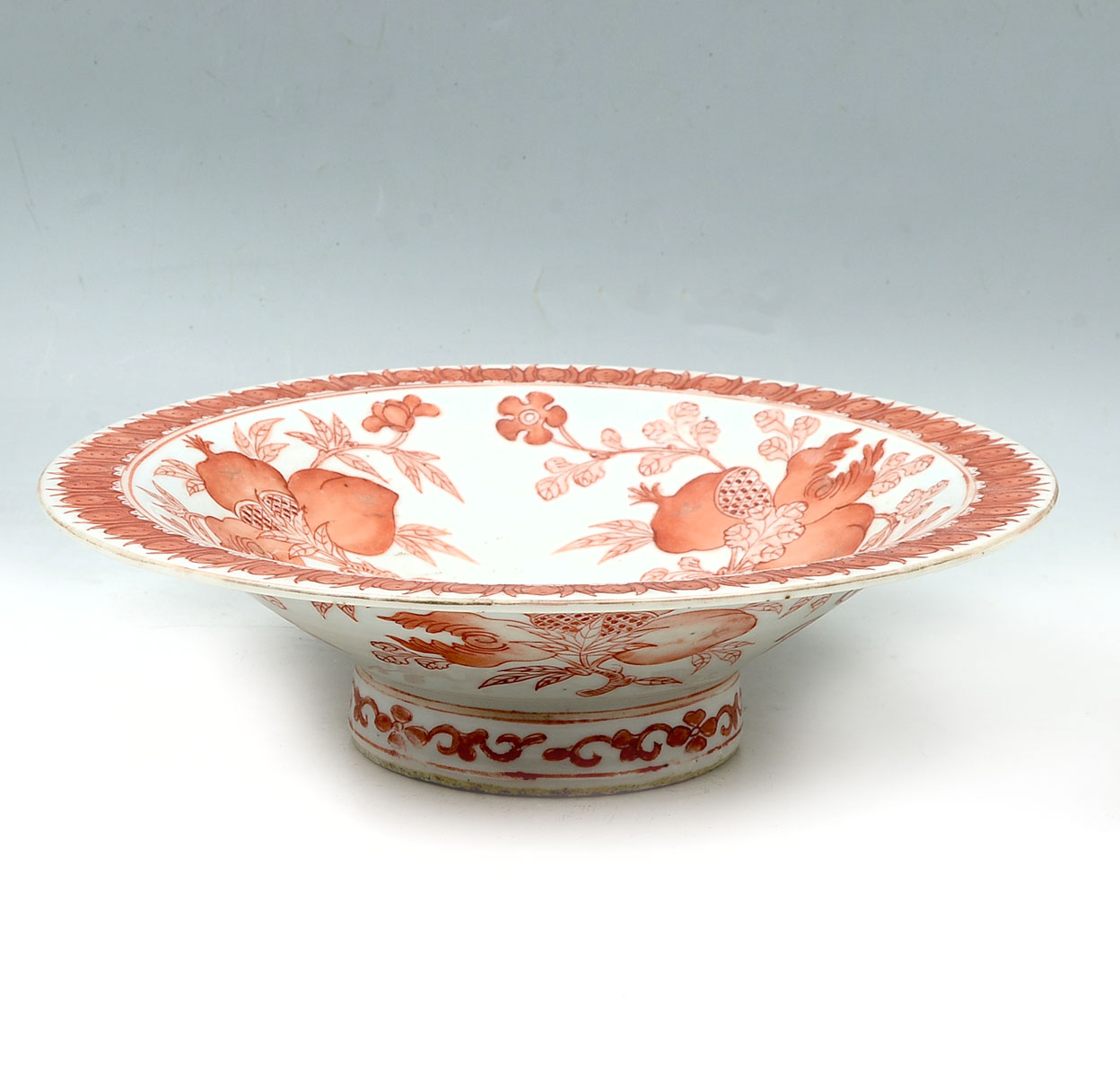 Appraisal: ORANGE WHITE CHINESE FOOTED BOWL Orange white Chinese footed bowl