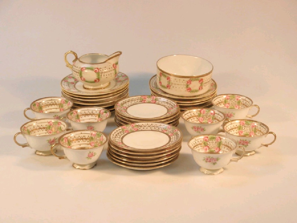 Appraisal: A Noritake bone china tea service painted with pink roses