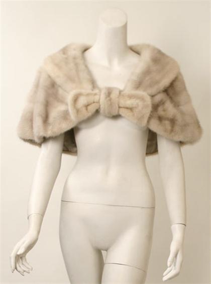 Appraisal: Bow detail champagne mink shawl s Labeled Harry K Ott