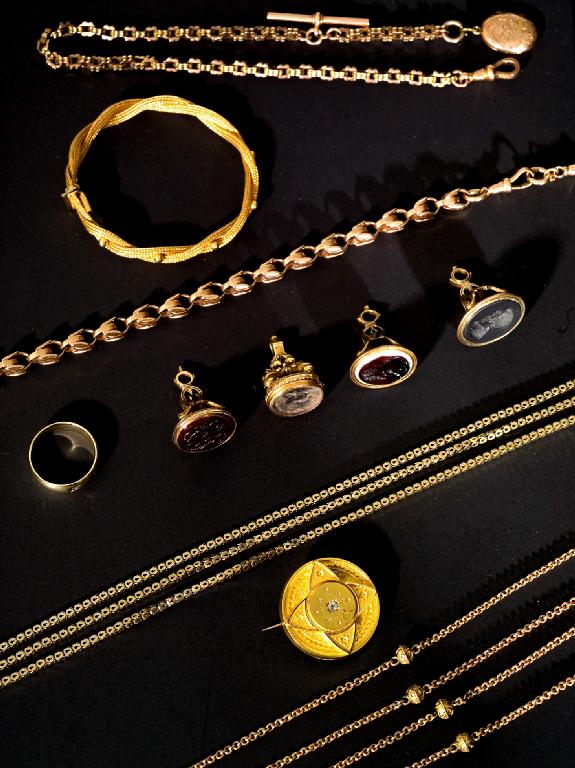 Appraisal: VICTORIAN ct GOLD WATCH CHAIN AND T-BAR with gold-plated locket