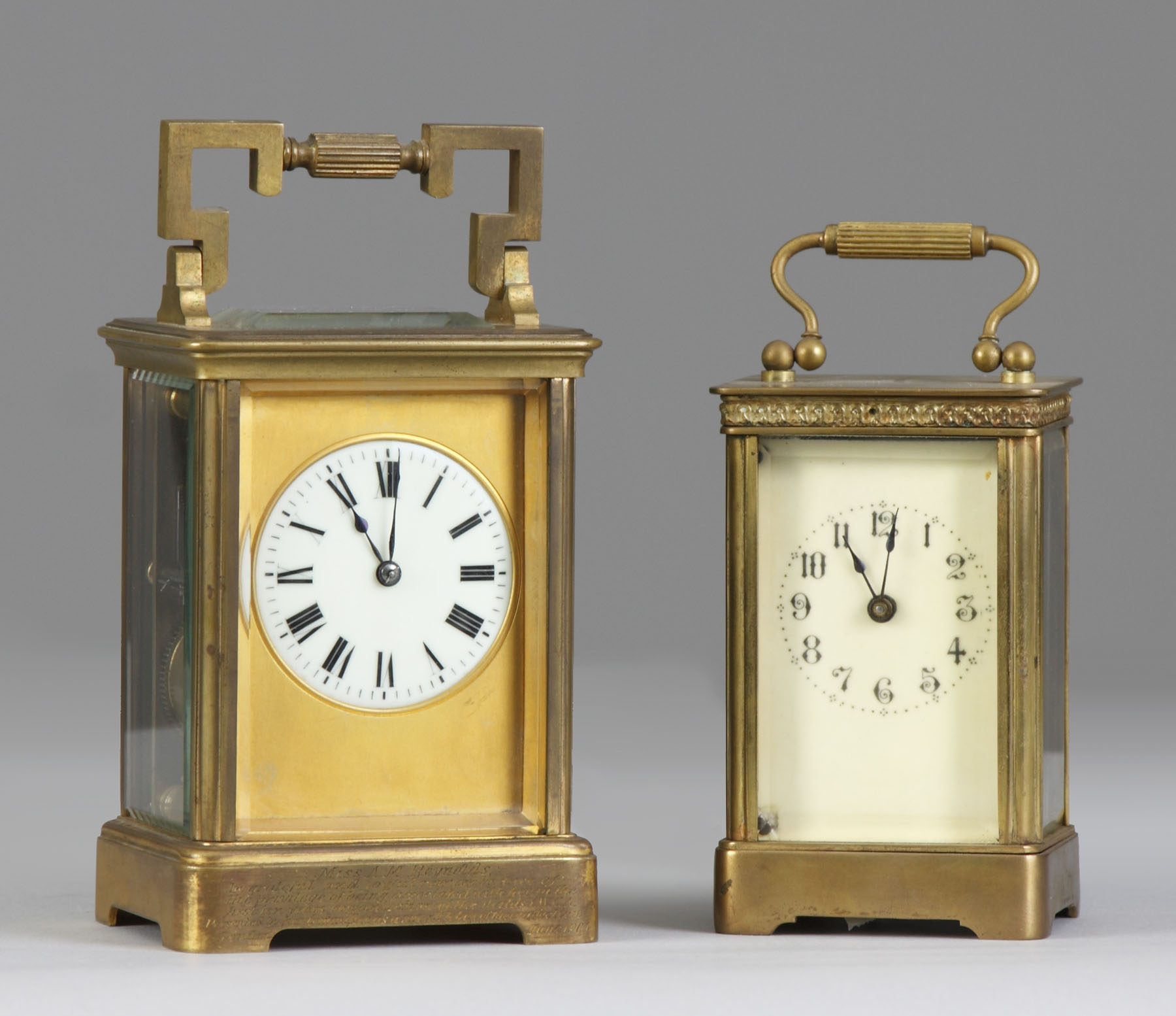 Appraisal: French Carriage Clock Brass beveled glass case Corner chip in