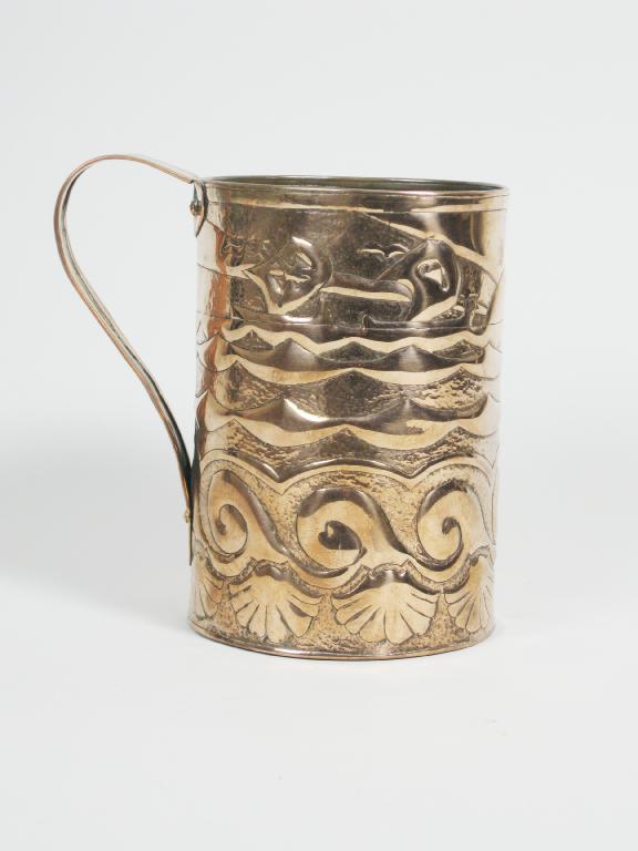 Appraisal: A Newlyn copper cylindrical Mug embossed seascape with sailing vessels