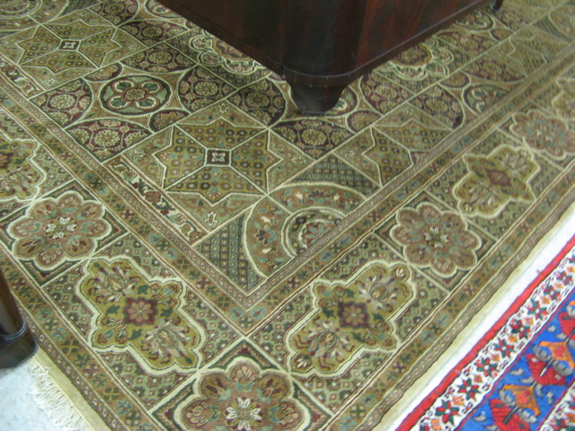 Appraisal: HAND KNOTTED ORIENTAL CARPET Indo-Persian overall floral panel design '