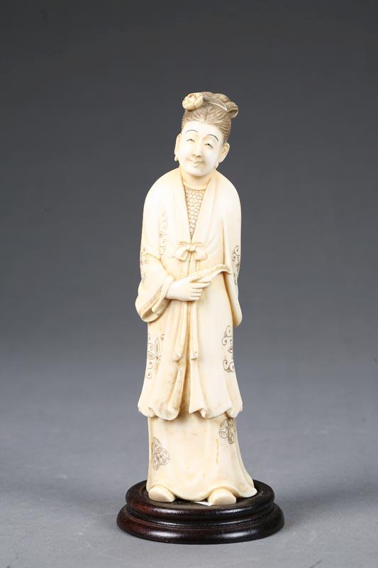 Appraisal: IVORY CARVING OF WOMAN China Figure of a smiling woman