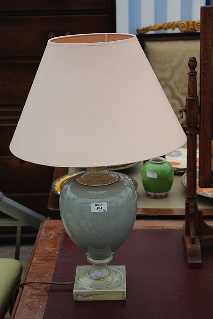 Appraisal: A GREEN GLAZED POTTERY TABLE LAMP of baluster form and