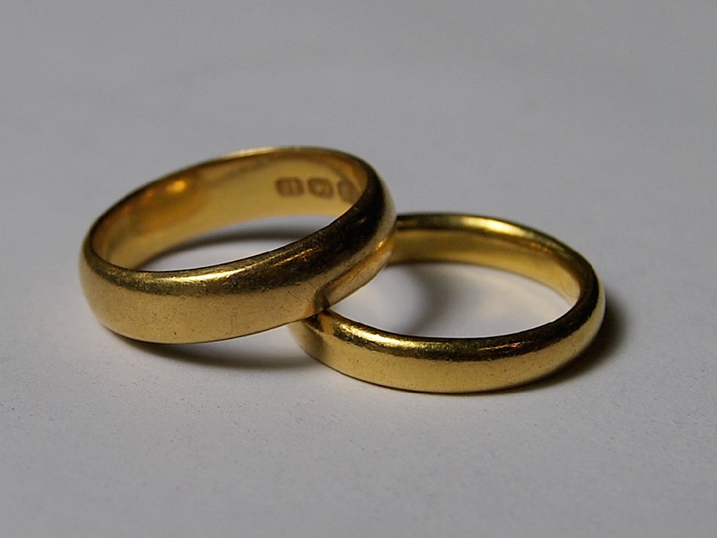 Appraisal: Two ct gold plain wedding bands - g total