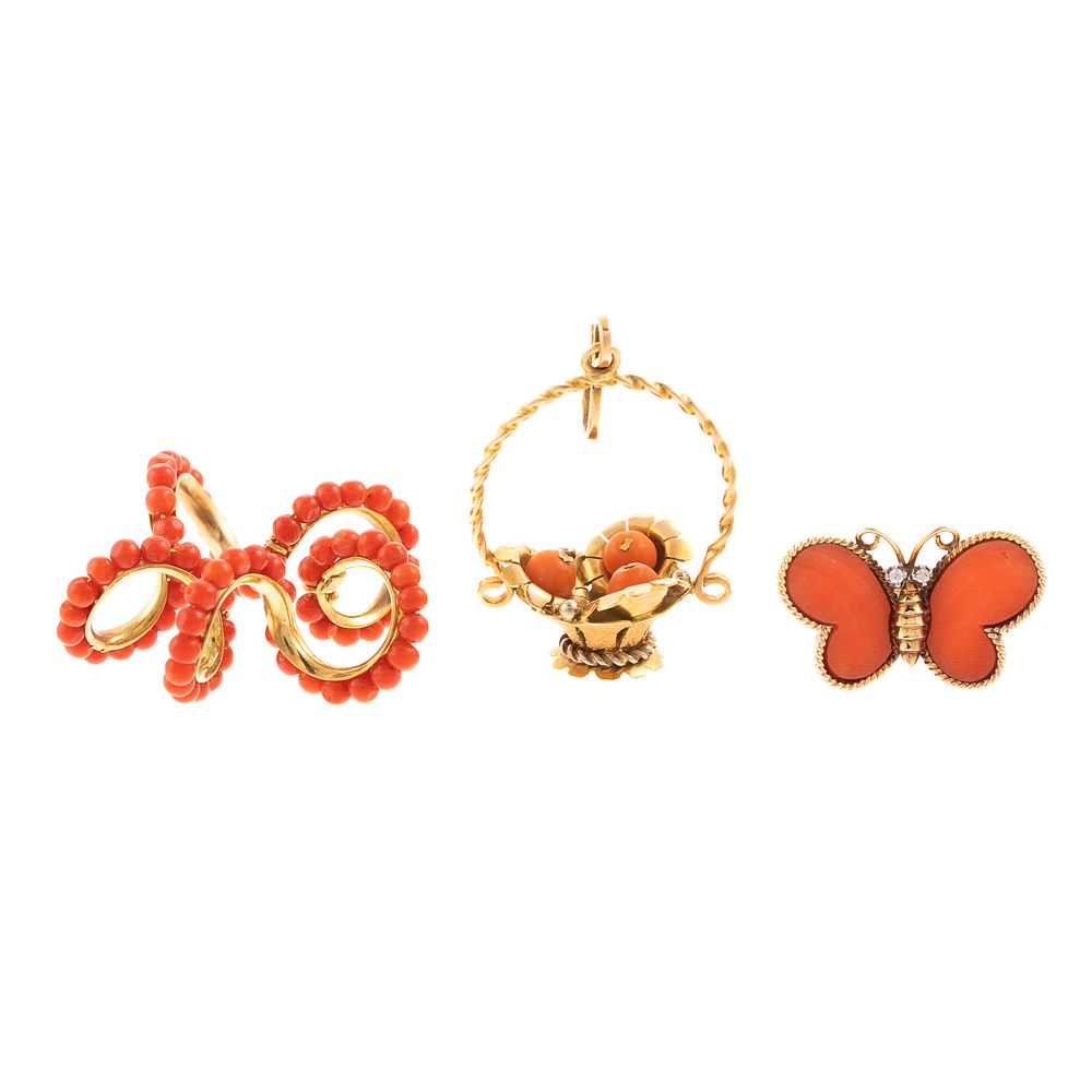 Appraisal: A Collection of Coral Charms Butterfly Ring K yellow gold