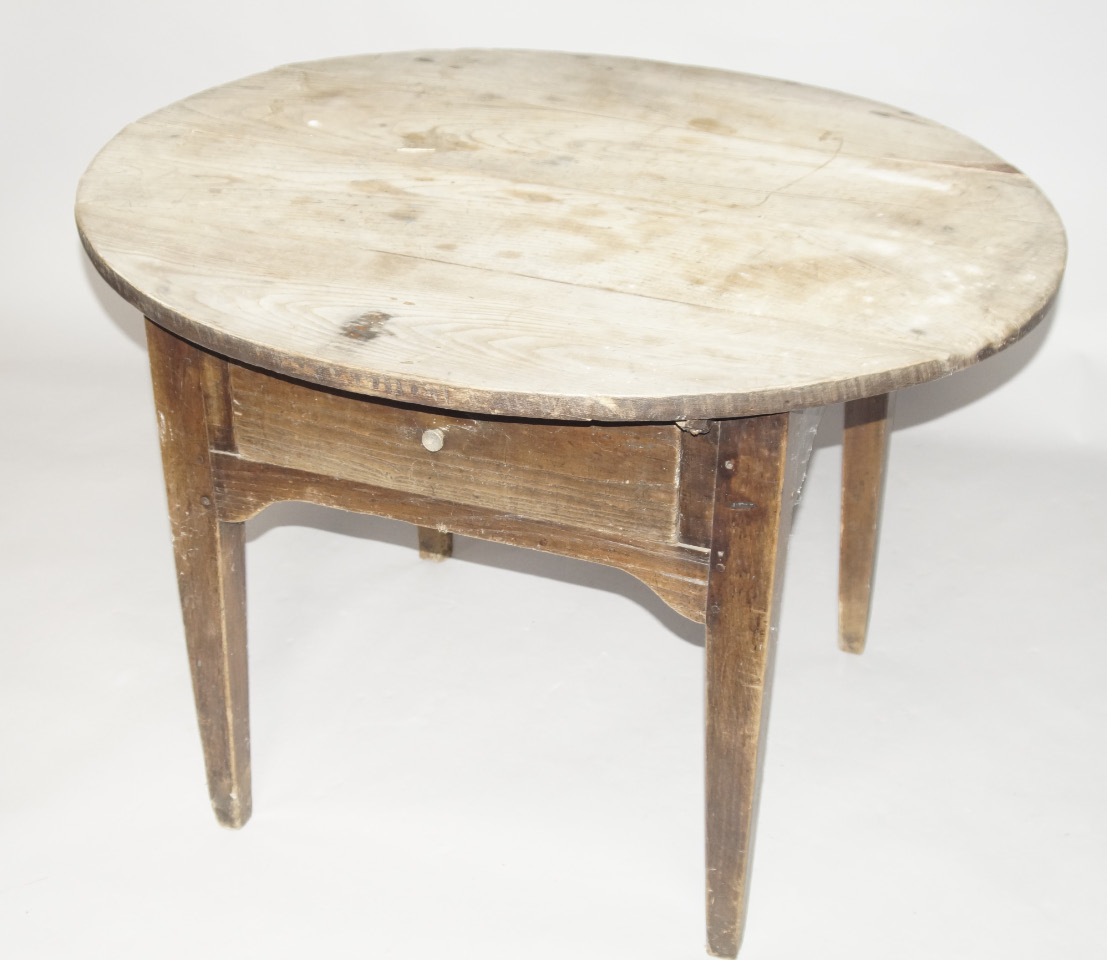 Appraisal: A thC elm country table with oval four plank top