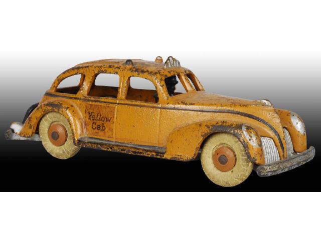 Appraisal: Cast Iron Hubley Car with Driver Toy Description Orange painted