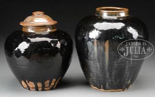 Appraisal: LOT OF FOUR GLAZED STORAGE JARS Two large Henan black