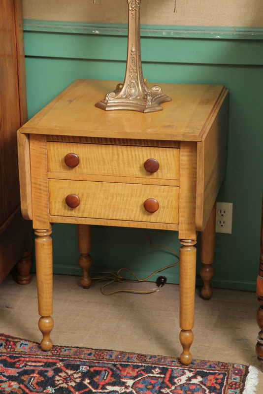 Appraisal: TWO DRAWER DROP LEAF STAND Curly maple with wooden pulls