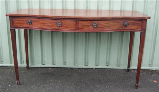 Appraisal: th century mahogany serpentine side table the top with two