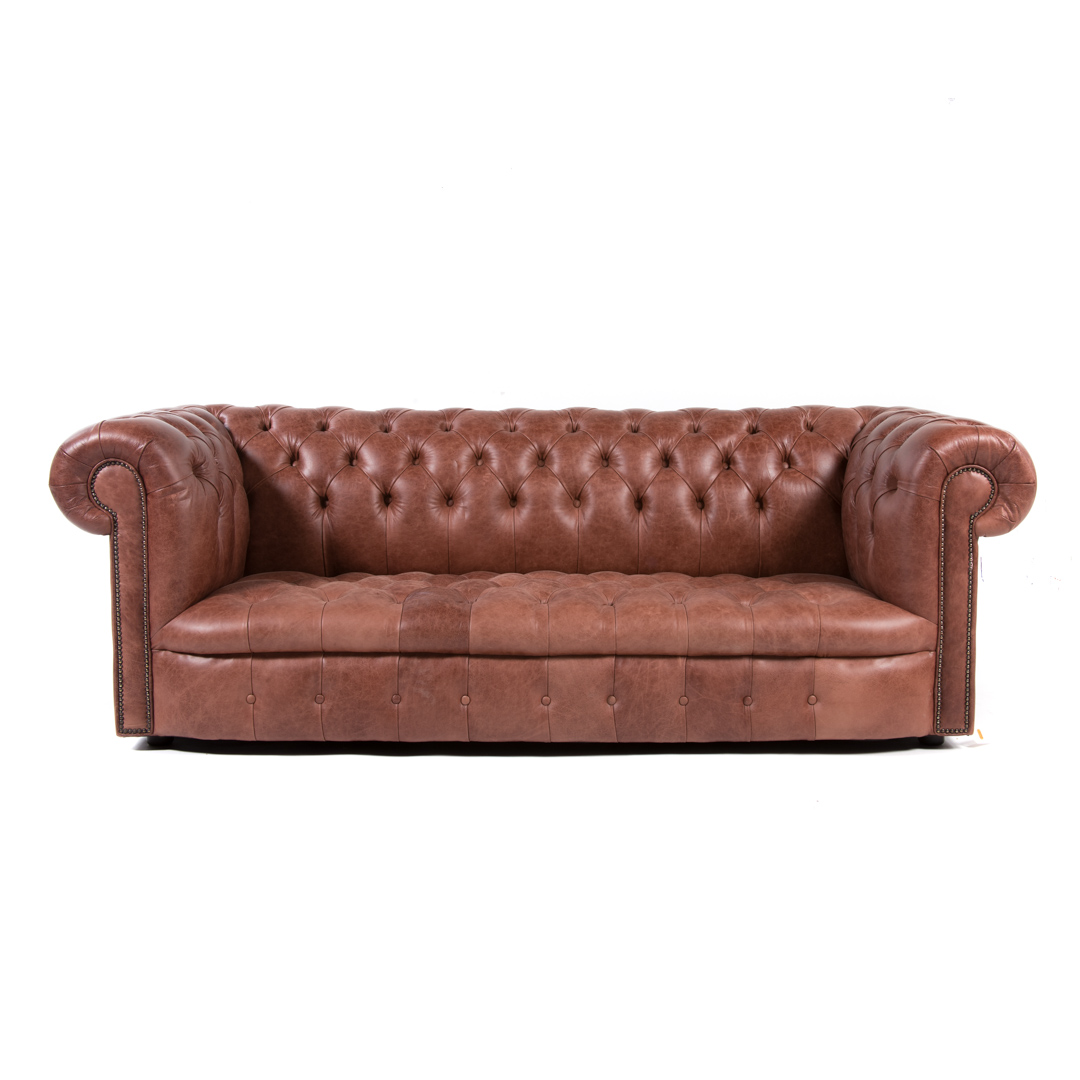 Appraisal: Chesterfield style leather upholstered sofa th century button upholstered back